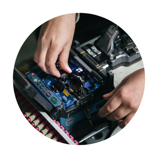 Someone working on an electronic part